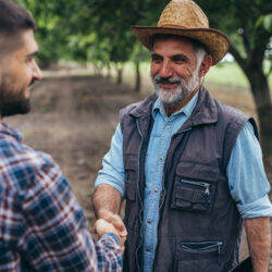 Farmers,Handshake,Outdoors,In,Filed farmers handshake outdoors in filed